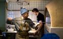 Watch food cooked in a pizza oven as you sit at your table in Holt