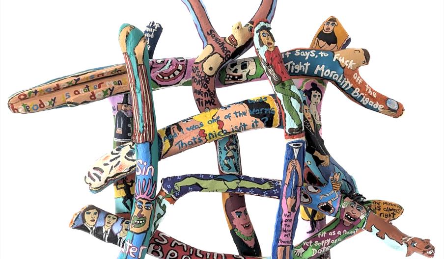 A driftwood painted sculpture