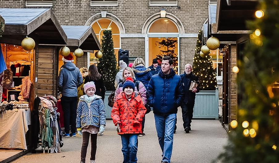 A family exploring the Christmas Market
