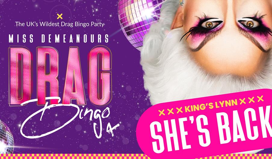 A picture of a drag queens eyes upside down, with a bright purple background and a sign that says, "She's Back!"