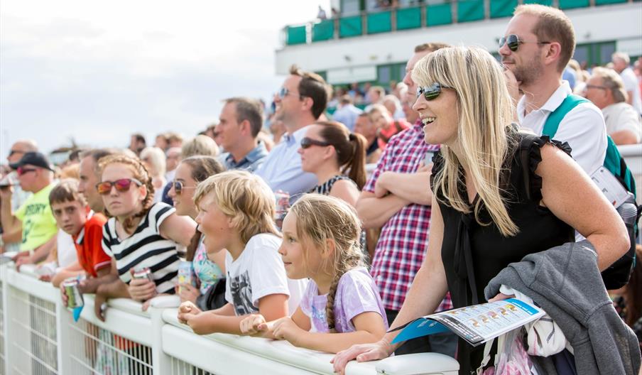 Crowds cheer on racing at Great Yarmouth Racecourse