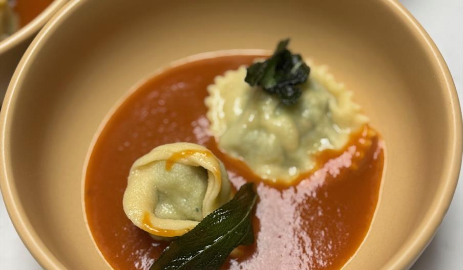 Fresh pasta in rich tomato sauce