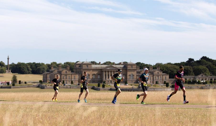 A group of people taking part in an Outlaw event