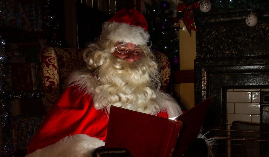 Santa reads his list!