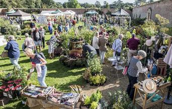 People browse the items for sale in Holkham's Walled Garden at the Garden and Outdoor Living Fair