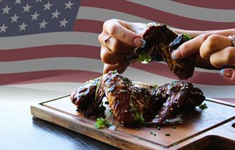 American Night Chicken Wings with American Flag in the background.