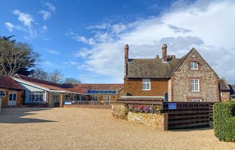 Caley Hall Hotel main building with blue sky