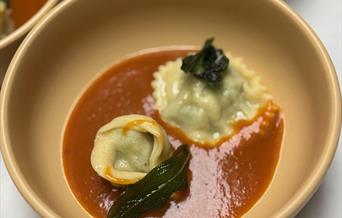 Fresh pasta in rich tomato sauce