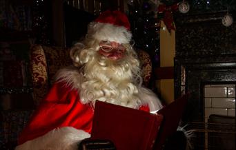 Santa reads his list!