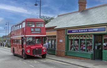 Vintage Bus waits for passengers outside Sheringham Shop