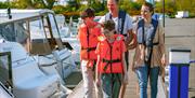 Family arriving for a boating holiday at Stalham Marina