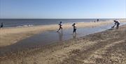 Bacton beach, kids and dog