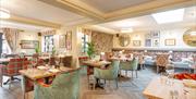 Enjoy A Meal In Our Restaurant At The Manor Coastal Hotel & Inn