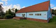 Heated shower and toilet block