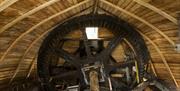 View of the brake wheel and wind shaft mechanism inside the cap of Horsey Windpump, Norfolk