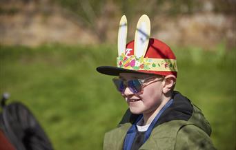 A child at a National Trust Easter trail