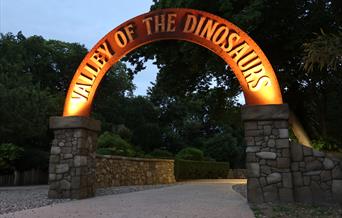 action packed jurassic adventure park in the evening