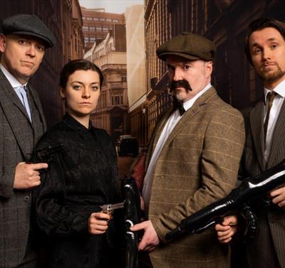 image of people dressed up in 'peaky blinders' get up