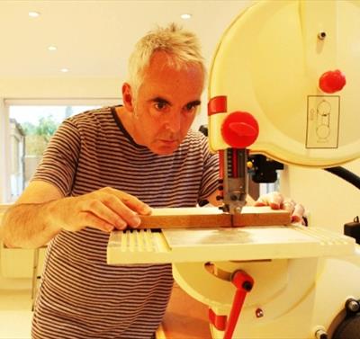 Jo FairFax using a machine
