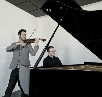 Violinist Miguel Suay (left) and pianist Patryk Frac (right)