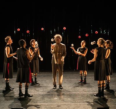 Group of jugglers in a circle