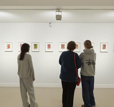 Photo of people enjoying the gallery space and exhibitions