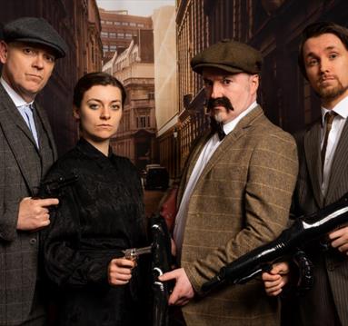 image of people dressed up in 'peaky blinders' get up