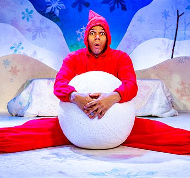 man with giant snowball