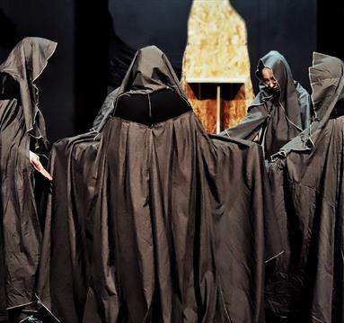 Hooded figures