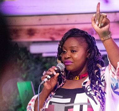 Singer holding a microphone