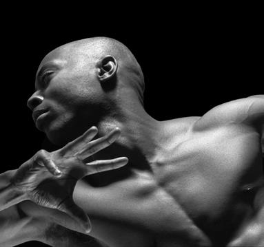 Top half of a male ballet dancer striking a pose