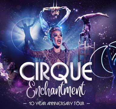 Member of cast sings whilst, in background, other cast members perform stunning acrobatic feats