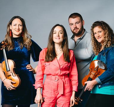 Orkney-born quartet FARA, pictured with violins