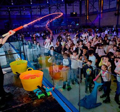 Photo of a UV Paint Ice Skating Party