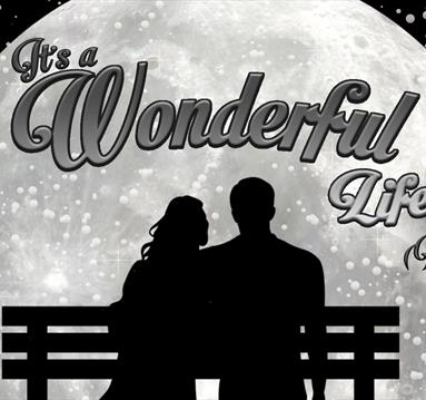 Graphic of a silhouette of a couple looking at a moon