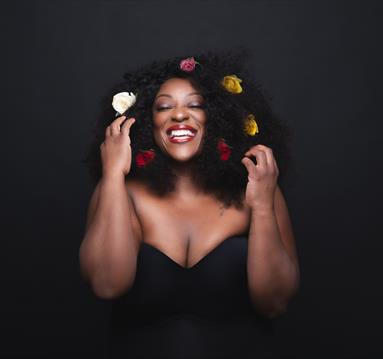 Judy Love has very big and very broad smile