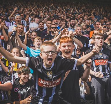 Notts County fans celebrating.