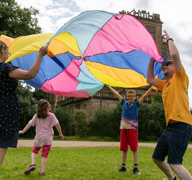 Kids playing in front of Hardwick Hall