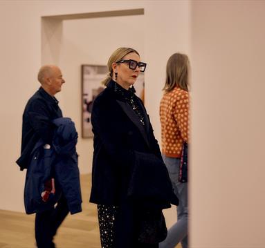 Photo of visitors in the gallery space