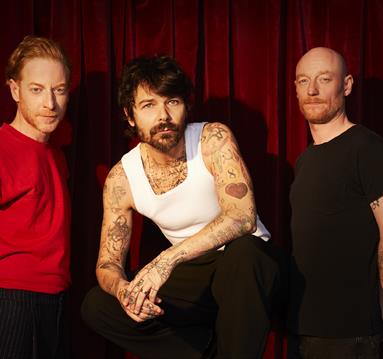 Image of the three members of Biffy Clyro