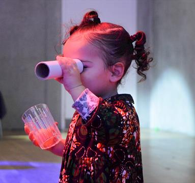 Photo of a young girl enjoying the workshop