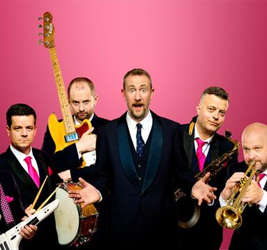 Photo of Alex Horne and his band