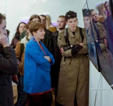 Photo of participants on a gallery walkthrough