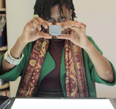 Photo of a woman looking at slides