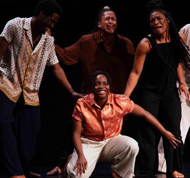 Photo of the dance troupe on stage