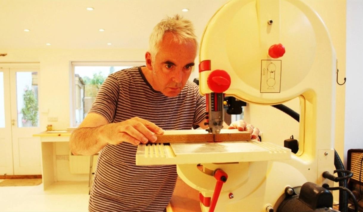Jo FairFax using a machine
