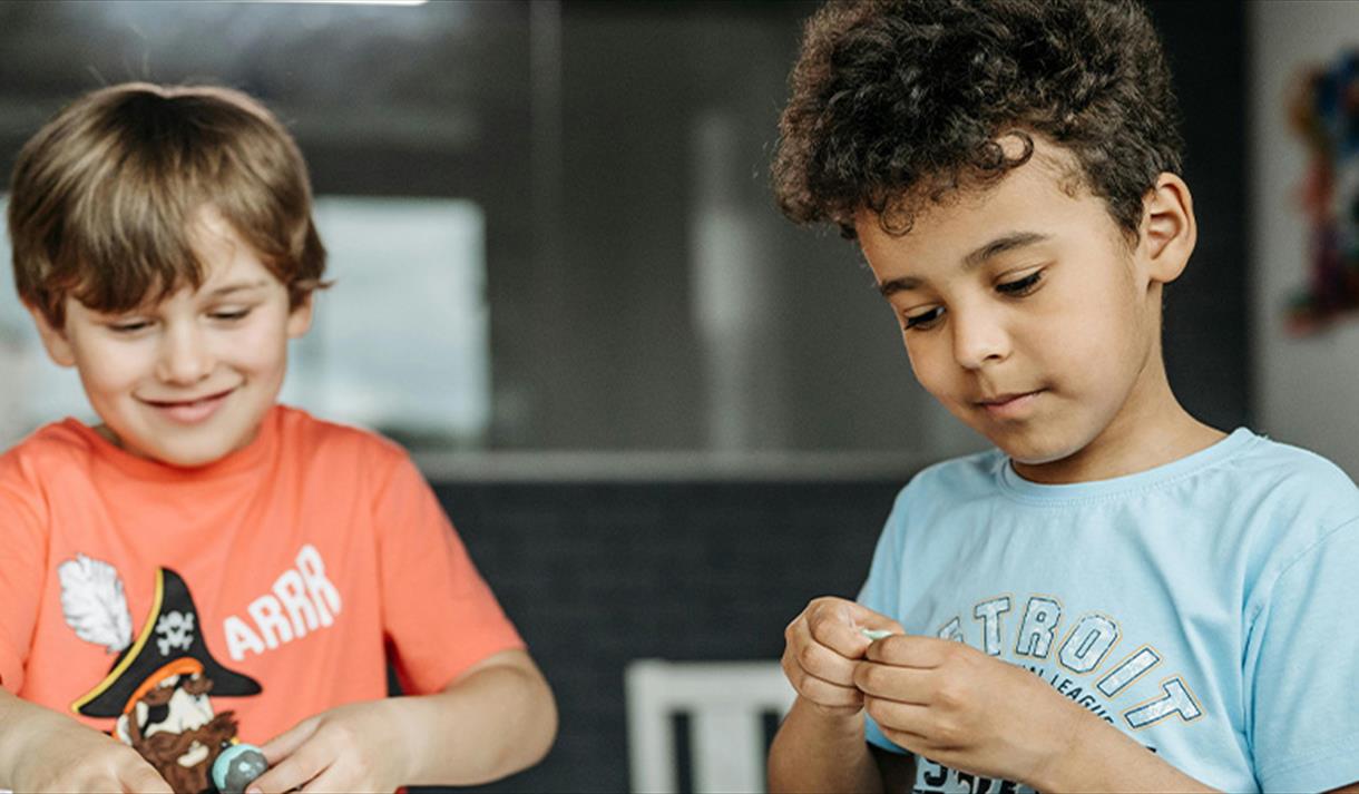 Kids making clay