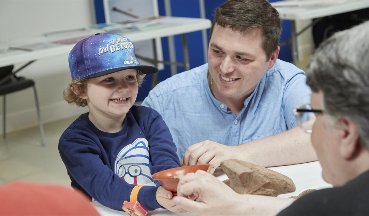 Child and parent at an educational workshop