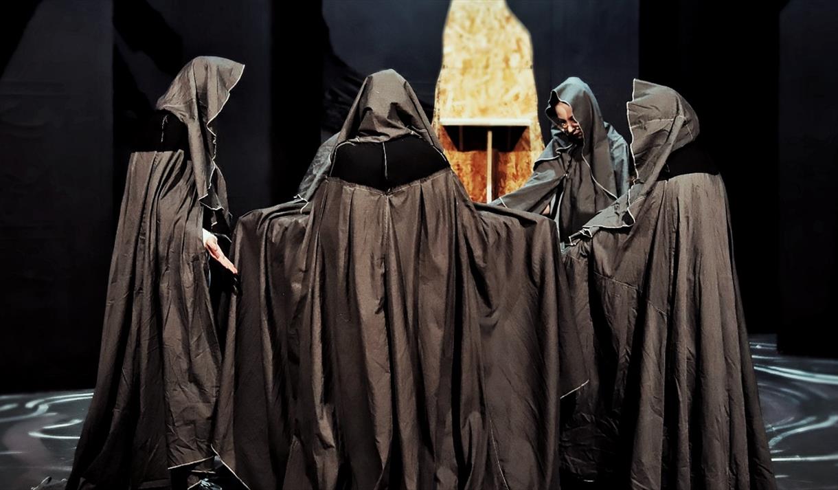Hooded figures