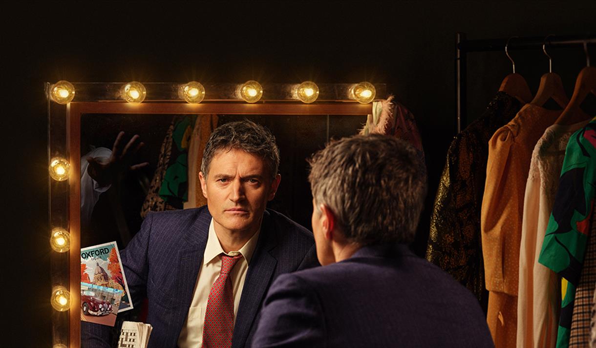 guy looking in the mirror